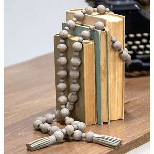 Distressed Wooden Bead Garland With TasselsDistressed Wooden Bead Garland With Tassels