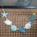 Wooden Beaded Seashells Mini Garland 37691;