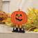Wooden Smiling Jack O Lantern In Boots on Base - 7.25"H